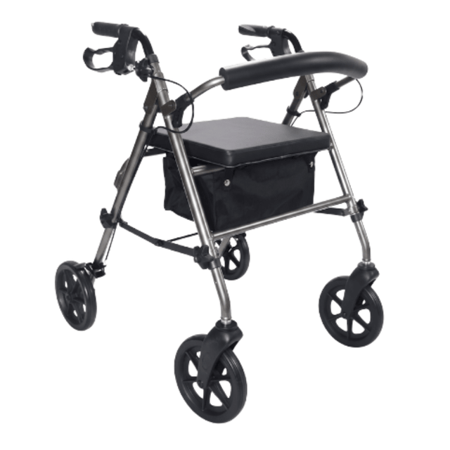 Grå Ibis rollator set skråt forfra med polstret sæde, rygbøjle og tekstilkurv