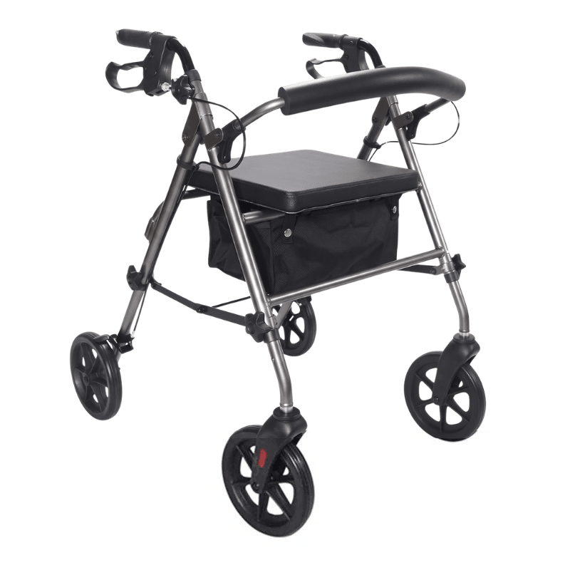 Grå Ibis rollator set skråt forfra med polstret sæde, rygbøjle og sort tekstilkurv