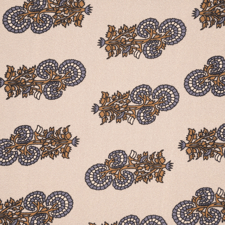 Tæt på det klassiske paisley-mønster på Beatrice turbanen i beige, brun og støvet blå